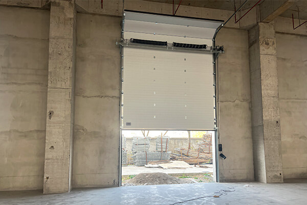 warehouse sectional steel doors pic